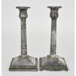 A Pair of Victorian Pillar Candlesticks, by James Dixon & Sons Ltd. Sheffield 1894 and 1896, with