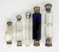 A Victorian Silver Mounted and Cut Glass Cylindrical Scent Bottle and Four Double Ended Scent