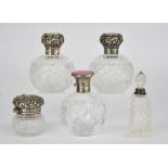 A Pair of Late Victorian Silver Mounted and Cut Glass Spherical Scent Bottles and Three Others,