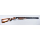 A 12 Bore Over and Under Shotgun, by Lanber, 28ins blued steel barrel with elevated top rib,