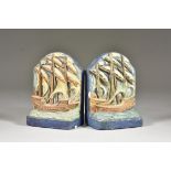 A Pair of Compton Pottery Bookends, Early 20th Century, modelled as galleons in full sail, decorated