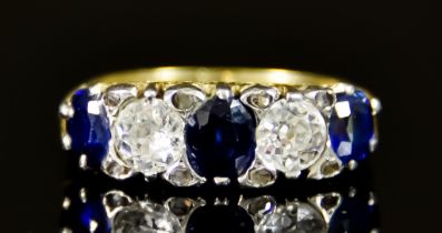 An 18ct Gold Sapphire and Diamond Five Stone Ring, 20th Century, set with two brilliant cut white