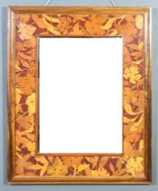 A Mahogany and Marquetry Rectangular Wall Mirror, 20th Century, the deep frame inlaid in various