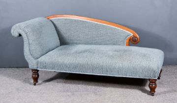 A Victorian Mahogany Framed Scroll End Chaise-Longue, upholstered in diaper pattern blue cloth, on