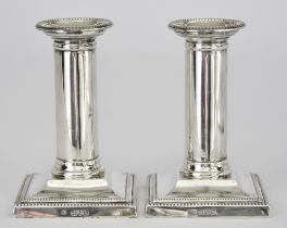 A Pair of Edward VII Silver Pillar Candlesticks, possibly by Thomas Bradbury & Sons, London 1903,