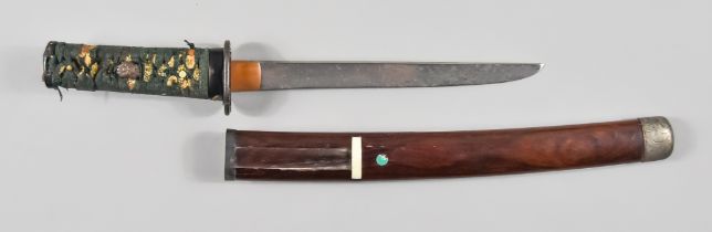 A Japanese Tanto, signed Yamato, circa 1315, bright steel blade, 9ins, iron tsuba, cotton wrapped