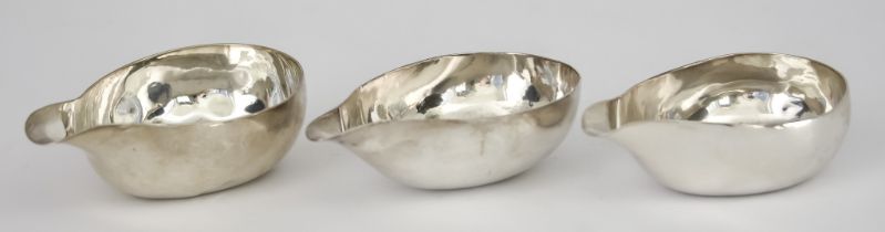 Three George III Silver Oval Pap Boats, maker's marks rubbed, 1763, 4ins overall, 1765, 4.25ins
