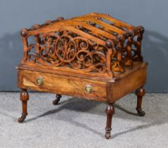 A Late Victorian Figured Walnut Three Division Canterbury, with fretted divisions and turned