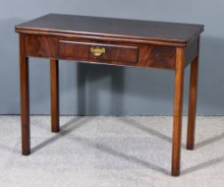An Early 20th Century Mahogany Tea Table by Waring and Gillow Ltd., with square edge and re-