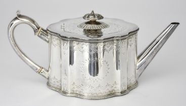 A Victorian Silver Oval Teapot by Henry Holland London 1872, of shaped outline with bead mounts,