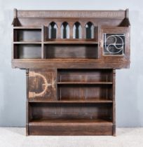 Liberty & Co, Arts and Crafts Oak Dresser/Bookcase, the superstructure with an embossed frieze panel