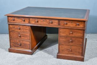 An Early Victorian Mahogany Partners Desk, with black leather inset and moulded edge to top, three