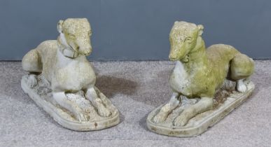 A Pair of Reconstituted Stone/Cement Recumbent Figures of Greyhounds, each 26ins wide x 15ins high