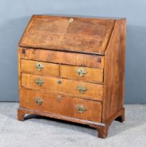 An 18th Century Figured Walnut Bureau, quarter veneered slope enclosing pigeon holes, small