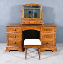 A Modern Burr and Cross Banded Walnut and Oak Pedestal Dressing Table by Frank Hudson, with