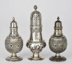 A Victorian Silver Sugar Caster and Two Silver Shakers, the sugar caster by Charles Stuart Harris,