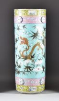 A Chinese Porcelain Stick Stand, Late 19th Century, enamelled in colours with a dragon amongst