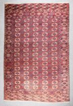 A 20th Century Indian Bokhara Carpet of Turkmen Design, woven in colours of ivory, navy blue and