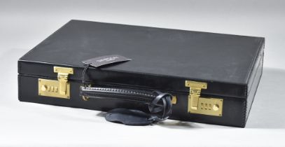 A Black Leather Attache Case, by Simpson of London, unused but slightly shop soiled, 17ins x 12ins