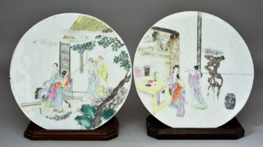 A Pair of Chinese Porcelain Circular Plaques, 19th Century, enamelled in colours with standing