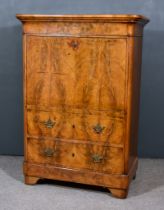 An Early 19th Century French Figured Walnut Secretaire Abattant, with moulded edge to top, fitted