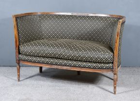 An Edwardian Mahogany Framed Two-Seat Tub-Shaped Settee, with moulded frame, the seat and back