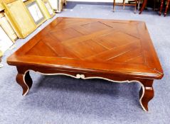 LARGE WALNUT SQUARE COFFEE TABLE with sectional top and with shaped apron and stylised cabriole legs