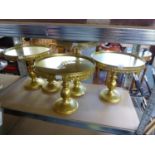 SIX PAIRS OF GRADUATED GOLD COLOURED METAL CAKE STANDS , 27.5cm HIGH AND SMALLER (12)