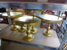 SIX PAIRS OF GRADUATED GOLD COLOURED METAL CAKE STANDS , 27.5cm HIGH AND SMALLER (12)