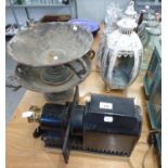 PAIR OF IRON GARDEN CAMPANA VASES, PLUS CREAM FINISH CANDLE LANTERN AND MAGIC LANTERN PROJECTOR, THE