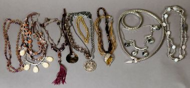 BRIGHT METAL LONG SNAKE NECKLACE, WITH CROSS OVER FRONT AND APPROX TEN OTHER NECKLACES VARIOUS (11)