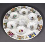 AN ISREALI PASSOVER SEDER PLATE, including the six associated dishes, a plated twin handled