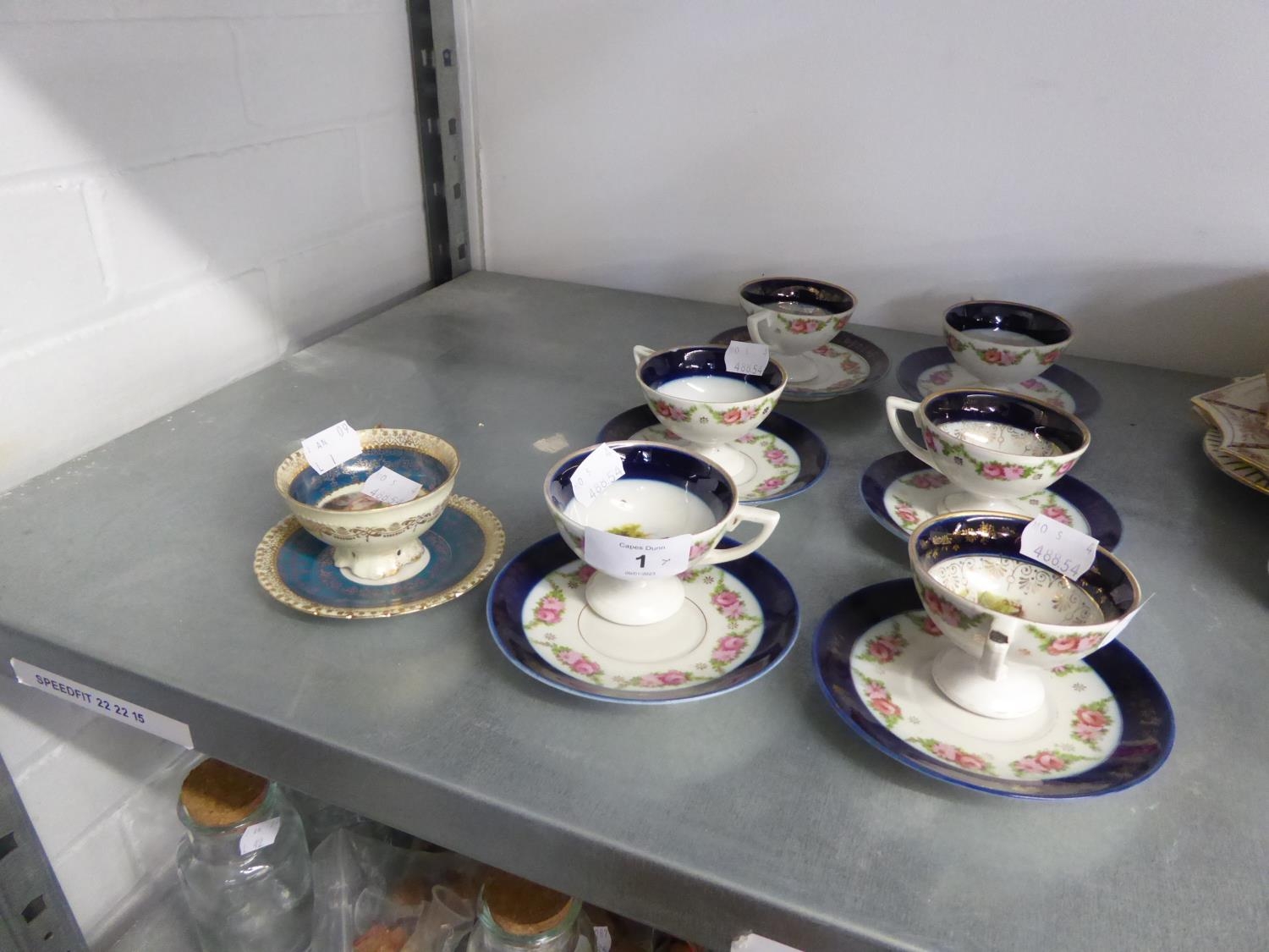 SET OF EARLY TWENTIETH CENTURY VIENNA PORCELAIN DEMI-TASSE COFFEE CUPS AND SAUCERS, DECORATED WITH