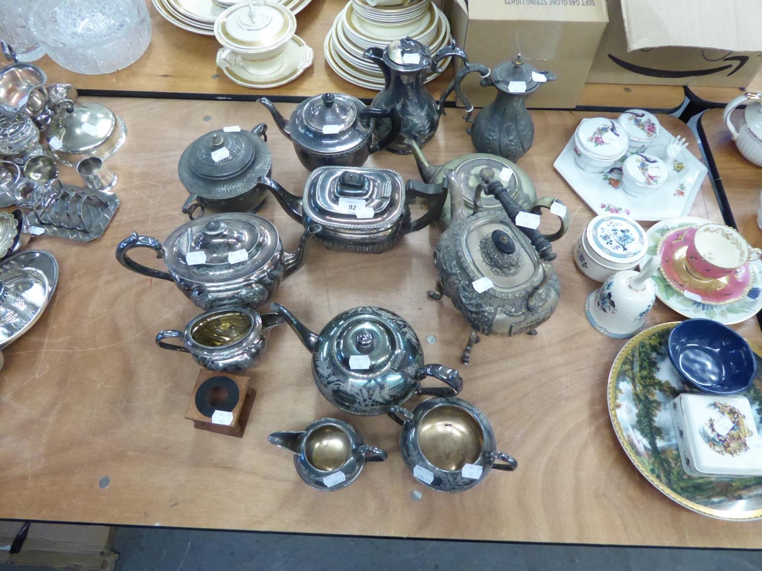 A GROUP OF ELECTROPLATED TEA AND COFFEE WARES, A THREE PIECE EPBM TEA SET, AN ENGRAVED EPNS TWO