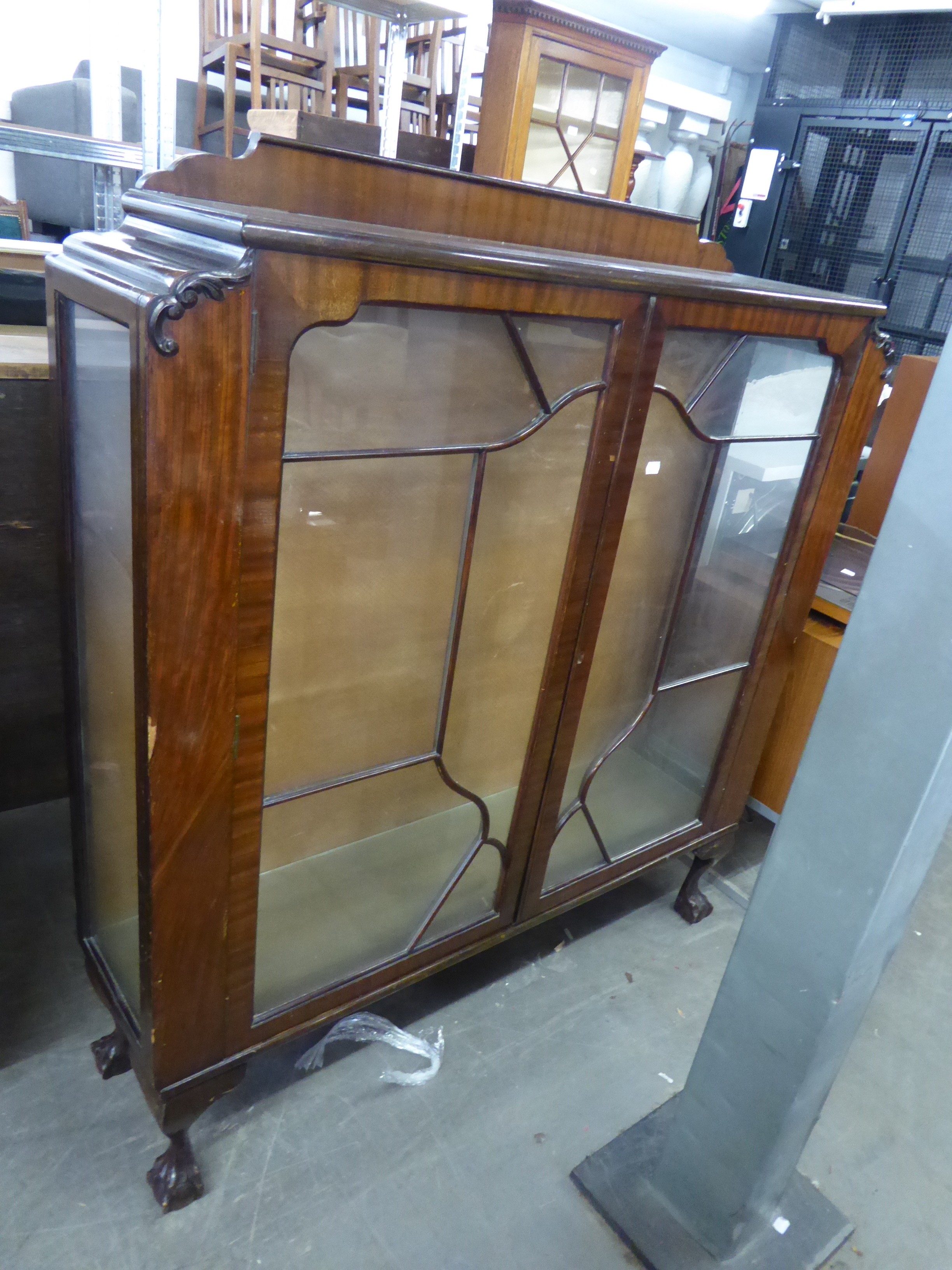 A MAHOGANY DISPLAY CABINET WITH TWO ASTRAGAL GLAZED DOORS, ON CABRIOLE LEGS WITH CLAW AND BALL FEET