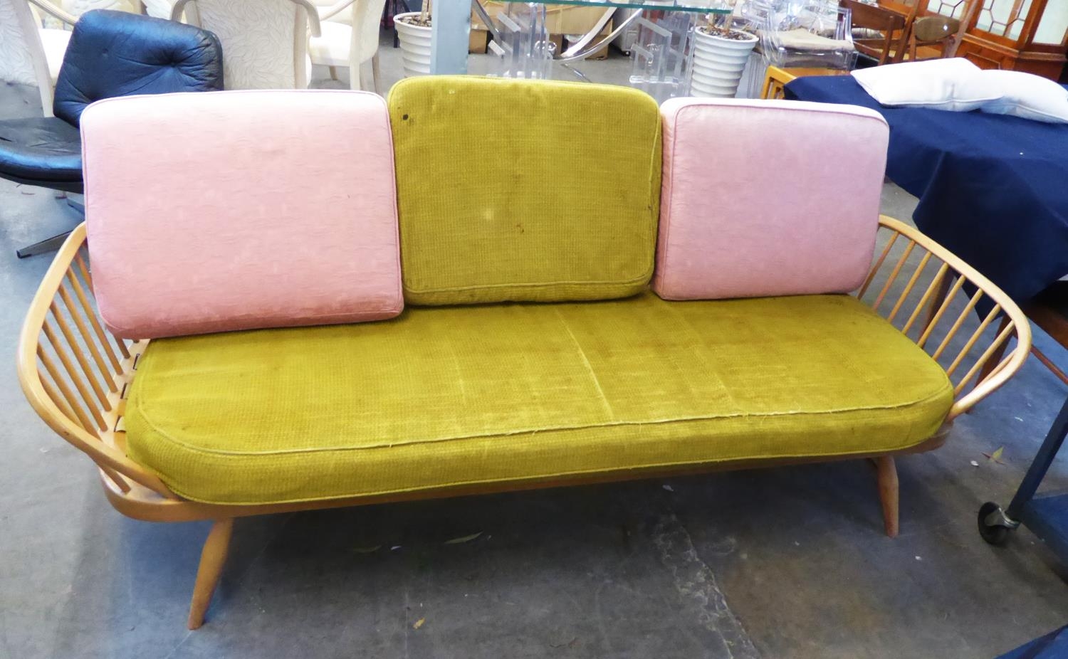 AN ERCOL STUDIO DAYBED WITH REMOVABLE CUSHIONS