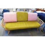 AN ERCOL STUDIO DAYBED WITH REMOVABLE CUSHIONS