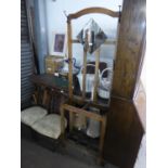 AN OAK HALLSTAND WITH SMALL FITTED MIRROR