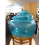 INFLATABLE FURNITURE – A BLUE PVC TRANSPARENT SOFA AND CHAIR WITH TWO PUMPS - ONE MAINS ELECTRIC AND