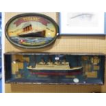 POST WAR MOULDED AND PAINTED PLASTER HALF HULL MODEL DEPICTING THE TITANIC, FAUX PHOTO'S AND OTHER