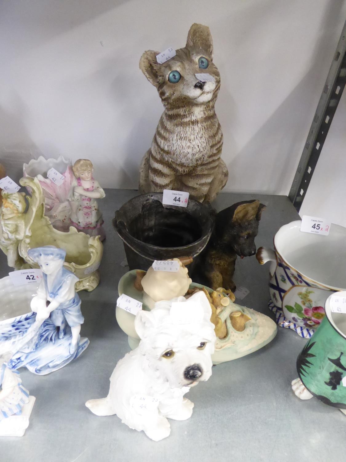 A LARGE RESIN MODEL OF A CAT; A RESIN MODEL OF A SCOTS TERRIER; A RESIN GROUP OF MICE IN A SHOE
