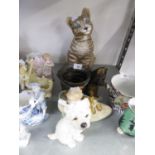 A LARGE RESIN MODEL OF A CAT; A RESIN MODEL OF A SCOTS TERRIER; A RESIN GROUP OF MICE IN A SHOE