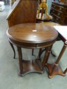 A MAHOGANY OVAL TWO TIER OCCASIONAL TABLE, WITH DRAWER