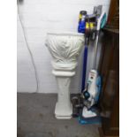 A WHITE GLAZED POTTERY FLORAL EMBOSSED JARDINIERE WITH MATCHING TALL BASE