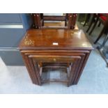 A NEST OF FOUR INLAID MAHOGANY OBLONG COFFEE TABLES