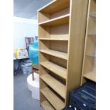 A PAIR OF PINE SEVEN TIER OPEN BOOKCASES