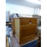 A PAIR OF PINE BEDSIDE PEDESTALS WITH A DRAWER OVER A FALL FRONT COMPARTMENT (2)