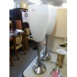 PAIR OF MODERN TALL TULIP FORM CHROMED AND BRUSHED METAL TABLE LAMPS, WITH OPAQUE WHITE GLASS