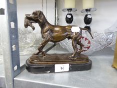 A MODERN BRONZE GROUP OF A RETRIEVER WITH DEAD GAME IN ITS MOUTH, ON BLACK MARBLE BASE