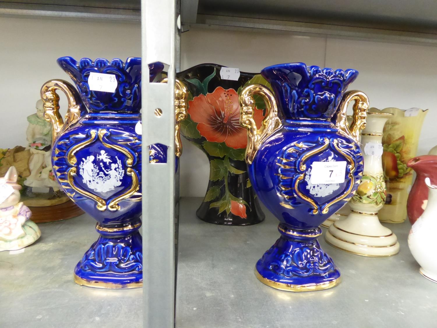 A PAIR OF ITALIAN BLUE AND GILT POTTERY TWO HANDLED VASES; A ‘BLUE SKY’ POTTERY MOORCROFT STYLE
